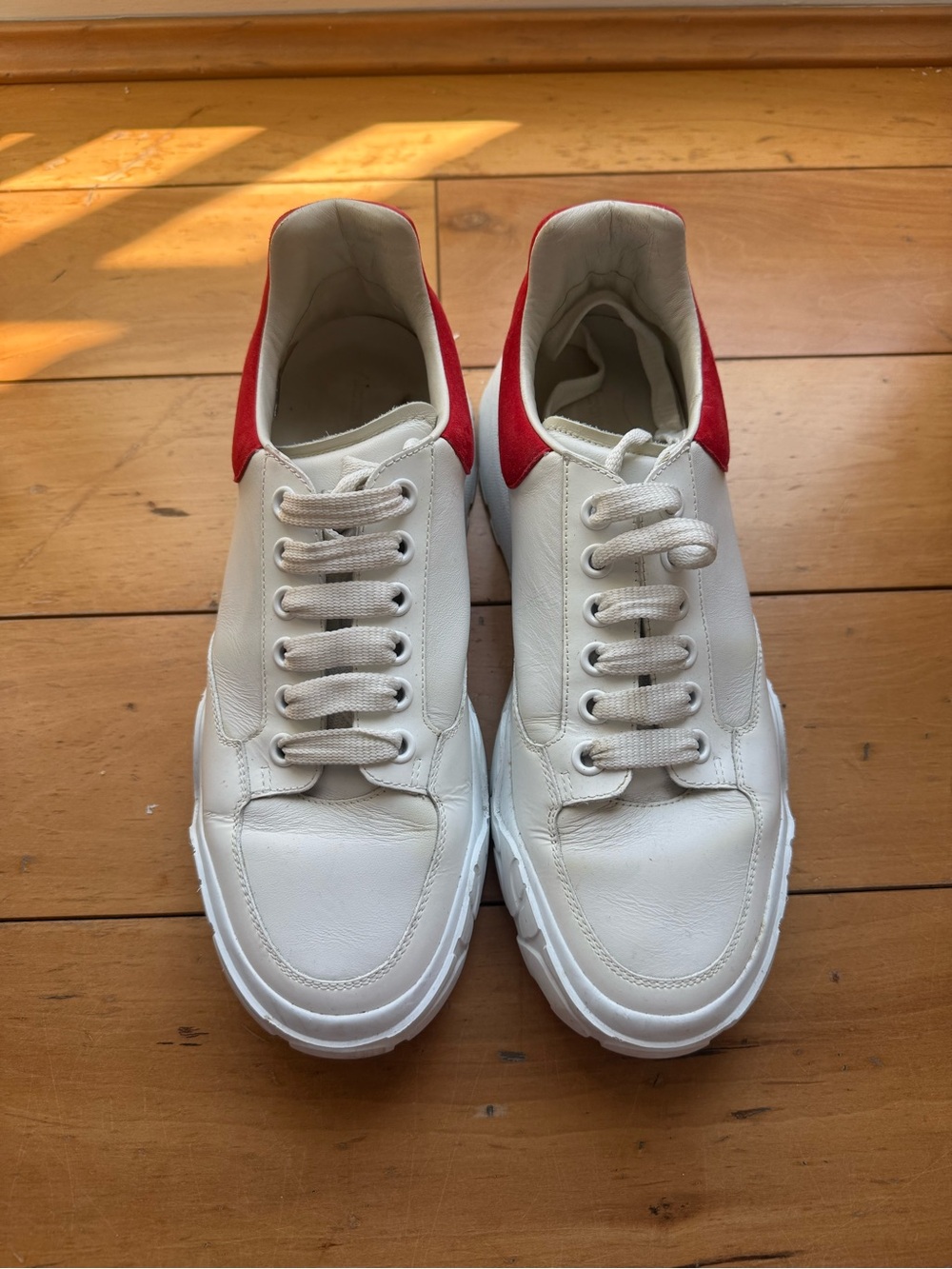 Alexander McQueen Oversized Leather Sneakers with Red Heel Accent